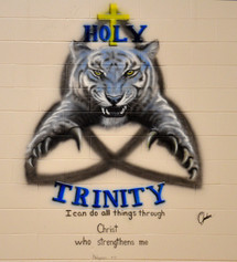 Holy Trinity Catholic School Painted logo on school wall
