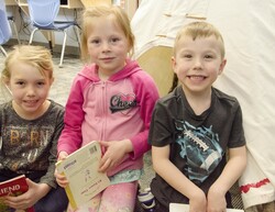 Kindergarten kids smiling in class